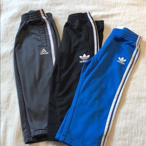3 pair of Adidas pants.